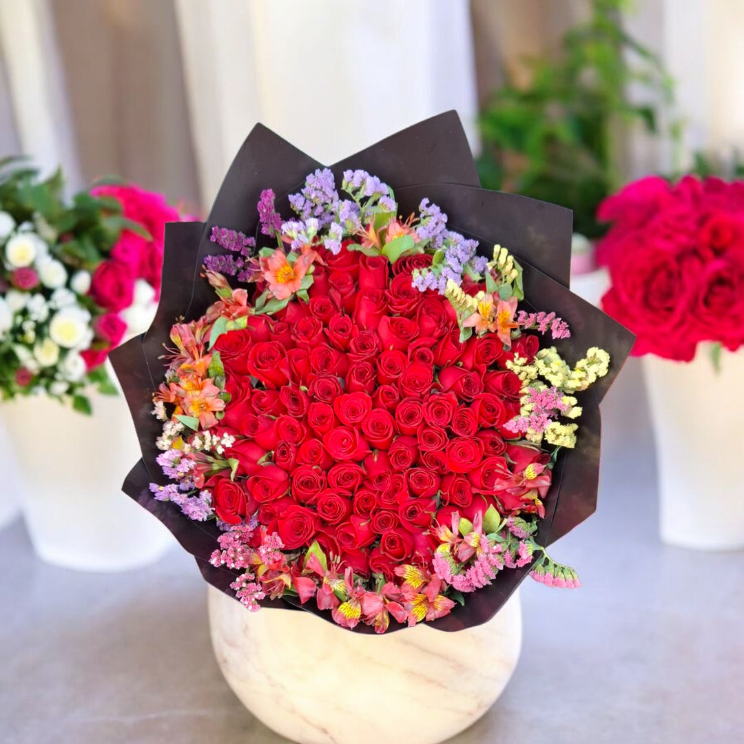 Ramo de 100 Rosas – Isis